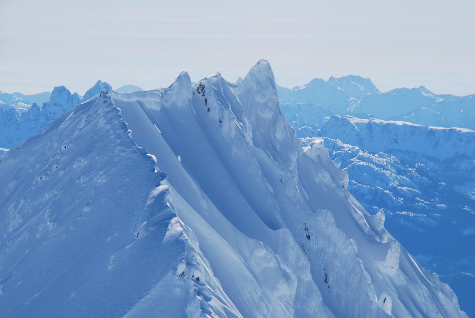 Aerial view of a snow-covered mountain ridge