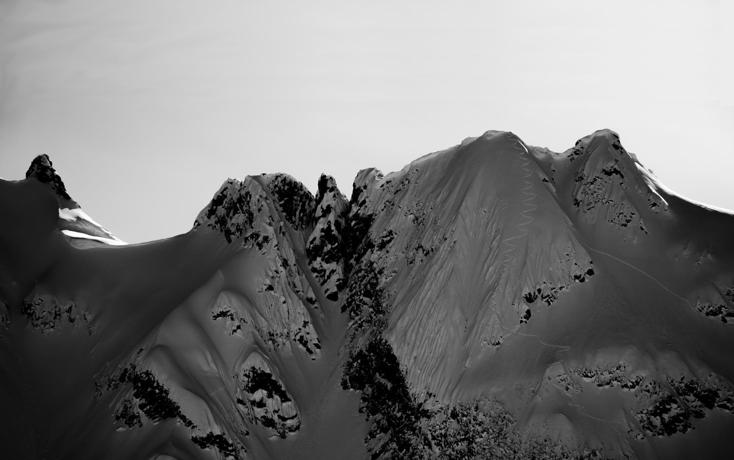 Aerial view of a snow-covered mountain ridge